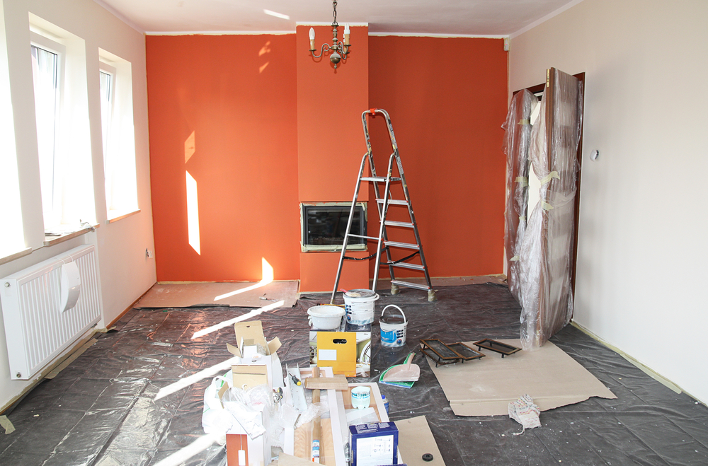 A team of professionals renovating a home, demonstrating a renovation service.